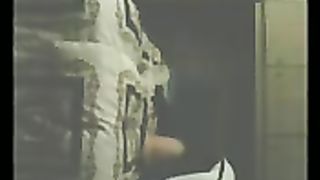 Nella cameretta del figlio mentre il marito non c'è