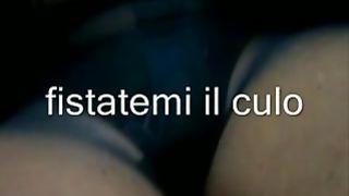 La slave Cagna in un car parking