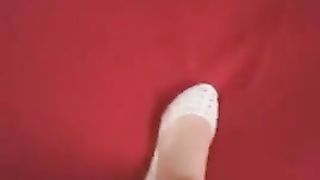 Piedini e scarpette bianche