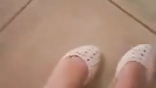 Piedini e scarpette bianche