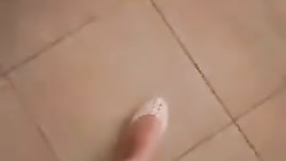 Piedini e scarpette bianche