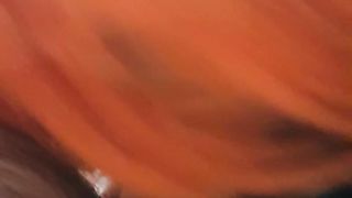 Pompino con parrucca rossa